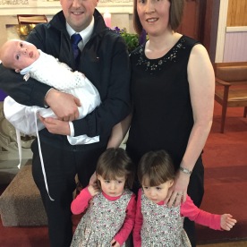 Cillian Patrick Nourmoyle with his parents Patrick and Michelle and sisters Rachel and Chloe on his baptism day.