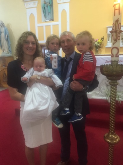 Tadhg with his parents Eimear and Seamus and his brothers Liam and Oisin on his baptism day.