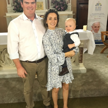 Jack Thomas Corry with his parents on his baptism day.